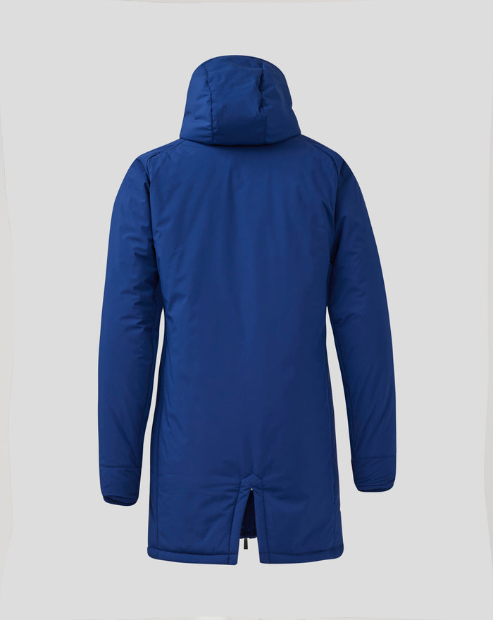 Rear view of a blue women's pro players bench jacket with hood