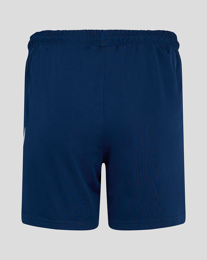 Back view of navy blue shorts with elastic waistband.