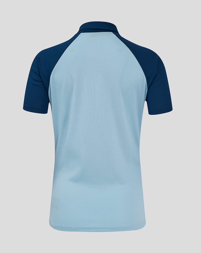 Back view of women's Rangers Pro Players Presentation Polo in light blue with navy sleeves.