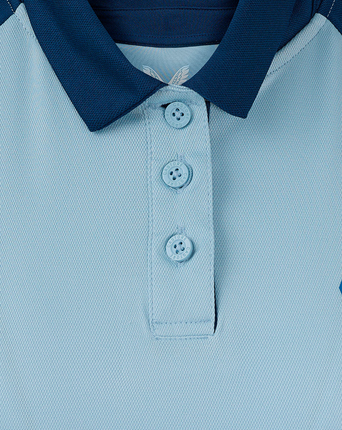 Close-up of the polo collar and placket highlighting self fabric collar navy color and three-button placket on light blue body