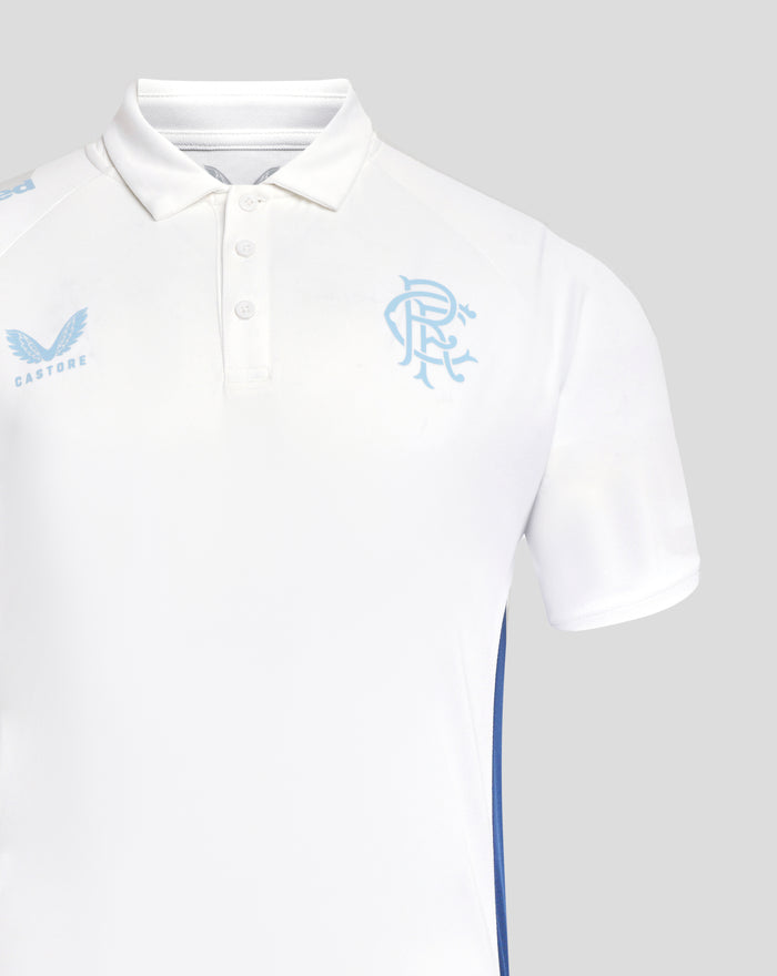 Close up front of a white womens pro players presentation polo showing blue Castore logo on the left chest and club crest on the right