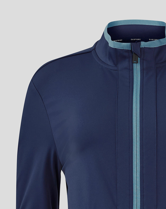 Navy travel jacket collar close up with pale blue trim and front center zip