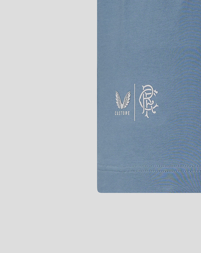 Blue women's Rangers FC travel short sleeve T shirt with Castore and club logos on the chest.