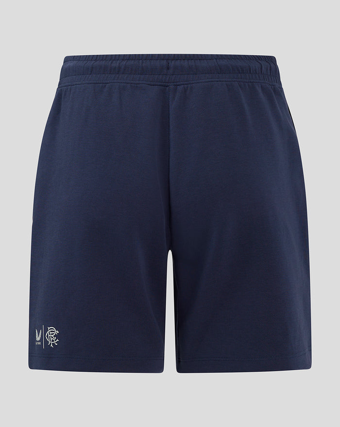 Back view of navy Rangers F.C. travel shorts showing an elastic waistband and small crest near the left hem.