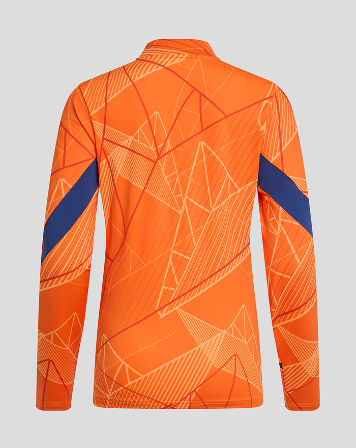 Back view of bright orange women's league matchday quarter zip midlayer with geometric pattern and blue sleeve stripes.