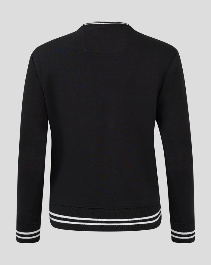 Rear view of black cropped fleece crewneck with white striped hem and cuffs.
