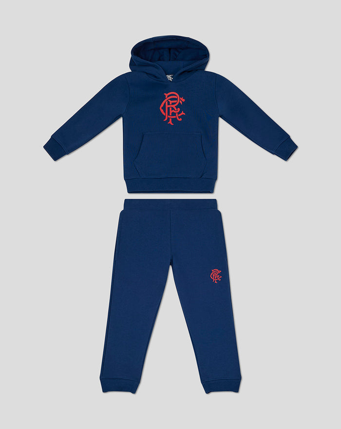 Infant navy core set with hooded sweatshirt showing a kangaroo pocket and red club crest at chest and left thigh