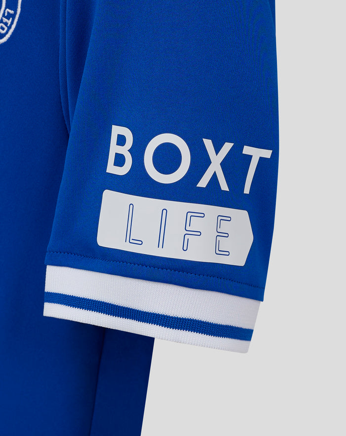 Back view of blue Ibrox 125 heritage shirt sleeve with a large white BOXT logo and striped cuff