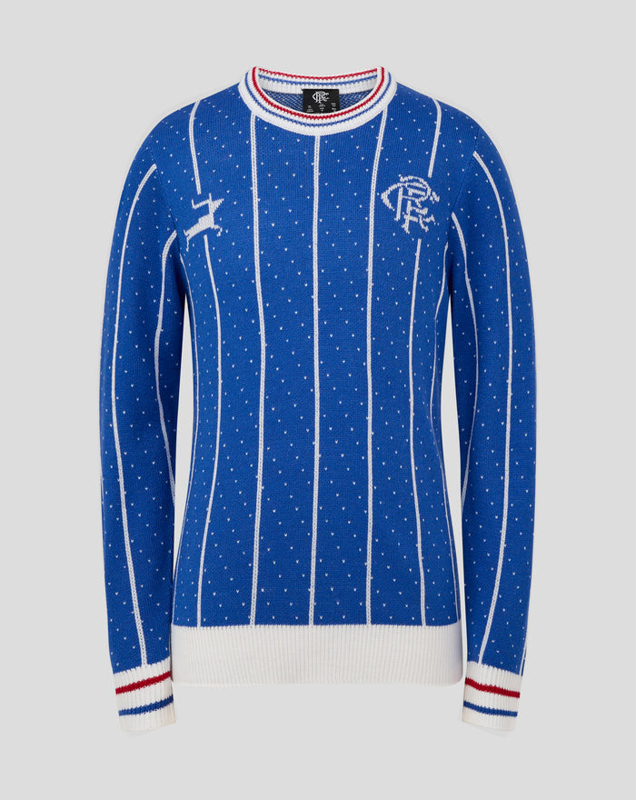 Blue junior retro Christmas jumper front view with white vertical stripes tiny white dots and ribbed white red and blue collar and cuffs