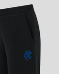 Close-up of a black JUNIOR CORE jogger showing elastic waistband and pocket with blue Rangers scroll crest embroidery