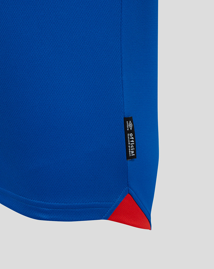 Blue Rangers FC Junior 25/26 Home Shirt sleeve close up with white cuff red trim and textured knit.