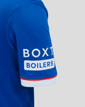 Blue Rangers junior home shirt close-up showing Umbro logo and club crest on the chest.