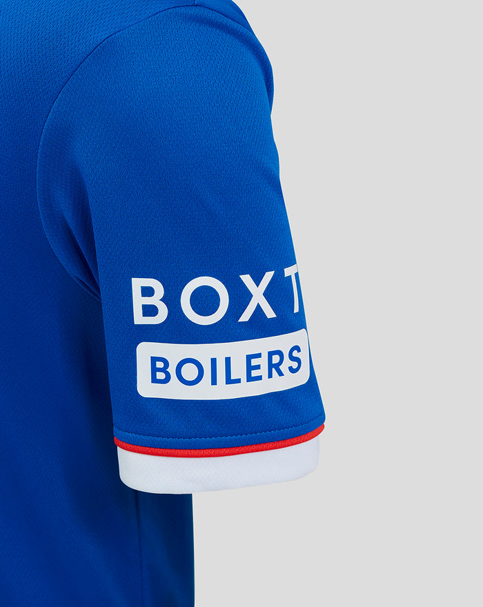 Blue Rangers junior home shirt close-up showing Umbro logo and club crest on the chest.