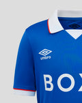 Sleeve detail of blue Rangers junior shirt with BOXT BOILERS sponsor graphic and white cuff trim.