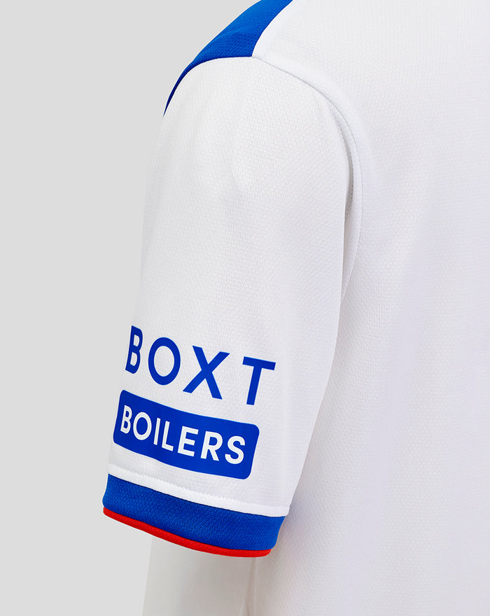 Sleeve detail of the away shirt showing BOX BOILERS sponsor logo on the white sleeve with blue cuff trim.