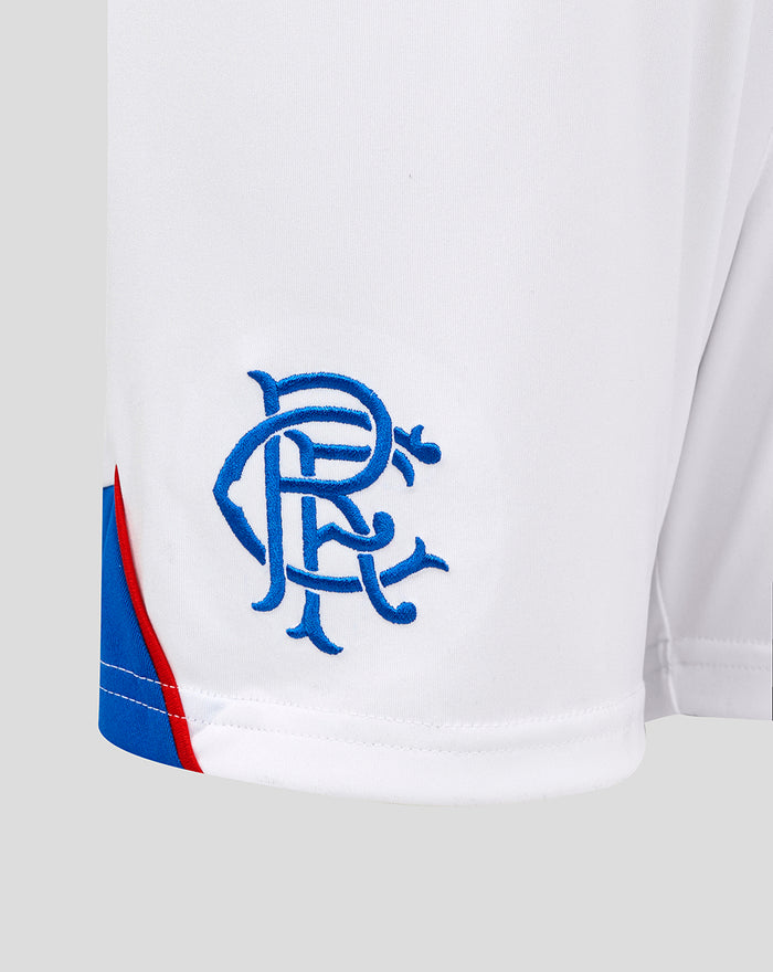 Close-up of white Rangers FC away shorts showing blue embroidered club crest and blue hem trim.