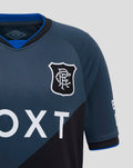 Close-up of navy Rangers junior third shirt chest area with crest and diagonal panel.