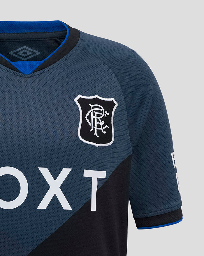 Close-up of navy Rangers junior third shirt chest area with crest and diagonal panel.