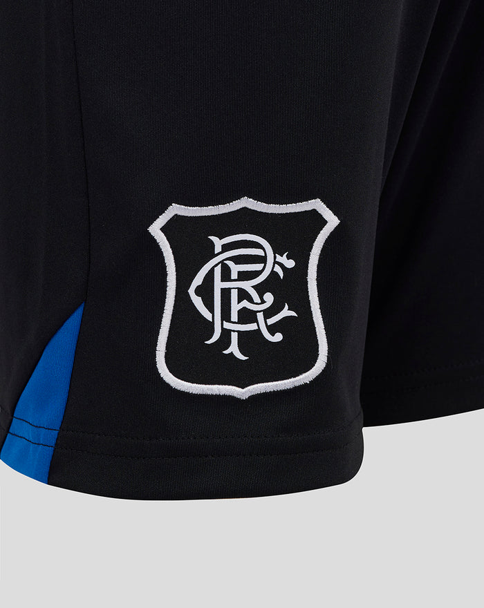 Close up of black Rangers Junior Third Shorts showing white crest patch and blue side panel.