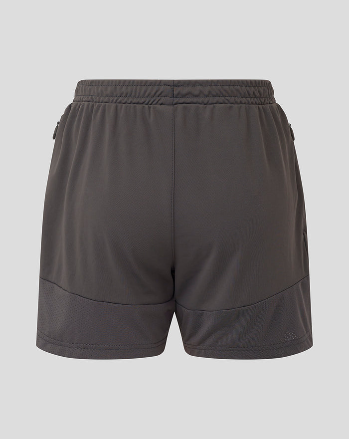 Back view of junior training knit shorts in thunderstorm gray with an elastic waistband.