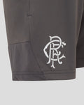 Close up of the left leg lower panel showing the crest and stitched hem detail on junior Thunderstorm shorts