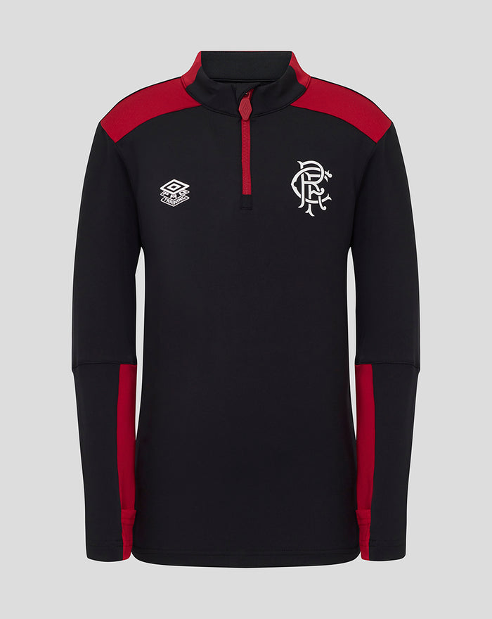 Front view of black junior coaches training top with red shoulder panels, red zip and white club crest on the left chest