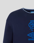 Front view of navy peacoat travel short sleeve T shirt with a full blue club crest and Umbro logo.