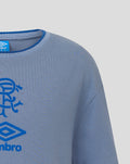 Front close up of grey junior travel T shirt showing blue Umbro diamond logo and club crest.
