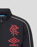 Navy Junior Travel Track Jacket in Caviar with red crest and Umbro logo on the chest and white piping along the shoulder.