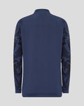 Back view of navy jacket with plain body and camo pattern sleeves.