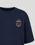 Close up of the Rangers crest on the left chest of the navy T shirt