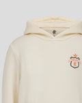 Close up of the cream Junior Rangers Hoodie neck showing a small Rangers emblem inside