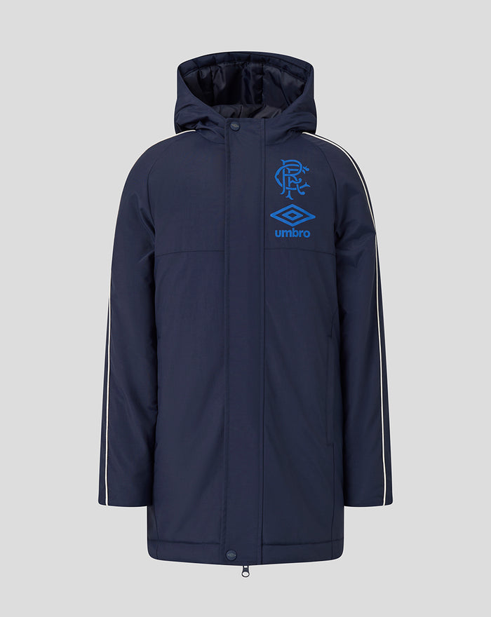 Front view of junior navy travel bench jacket with blue crest and Umbro logo on the chest and a hood