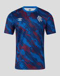 Front view of a junior Armed Forces Day range tee with blue and red multi terrain print, self fabric crew collar, short raglan sleeves and Rangers crest on the chest.