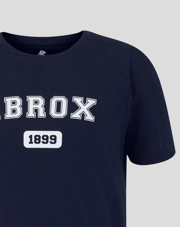 Navy junior Ibrox varsity tee close up of neckline with partial IBROX lettering across the chest