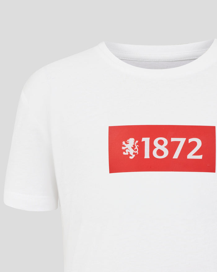 White junior varsity T shirt with a bold red 1872 block graphic and lion emblem on the chest