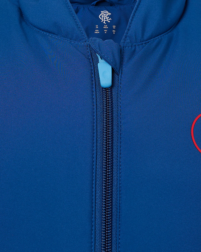 Close-up of navy Junior Rangers Gilet zipper with a light blue pull and front crest