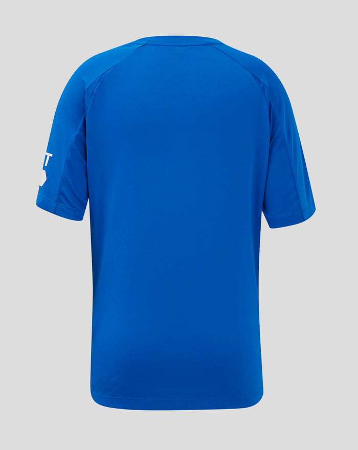 Rear view showing curved hem of blue Rangers junior home shirt.