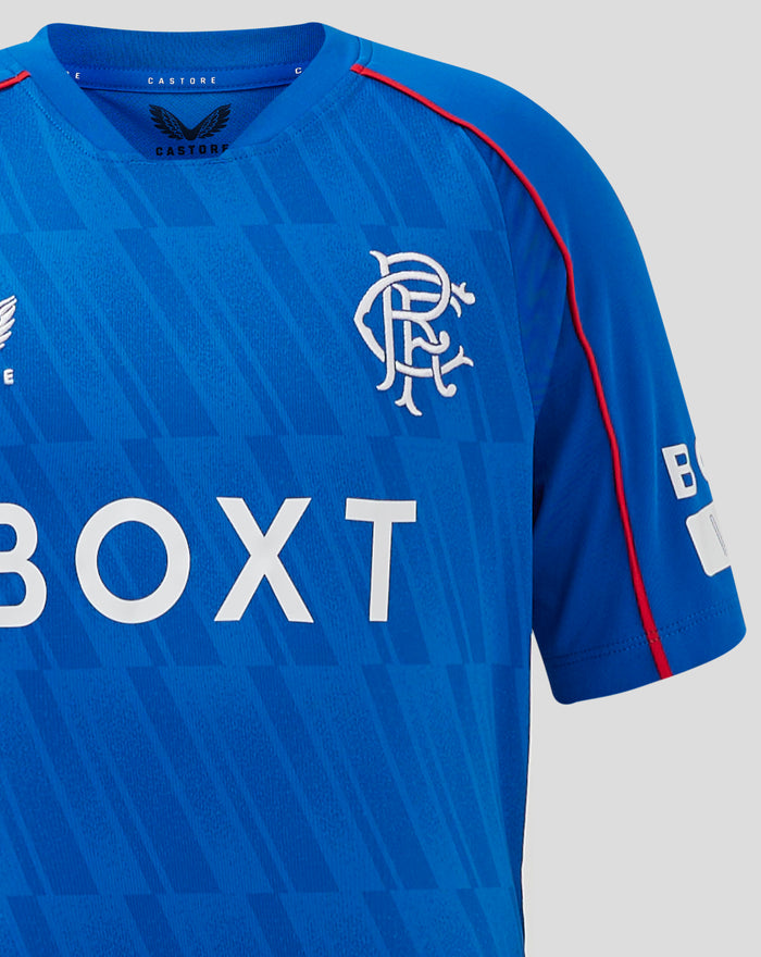 Close-up of blue Rangers junior home shirt with left chest crest and V-neck collar.
