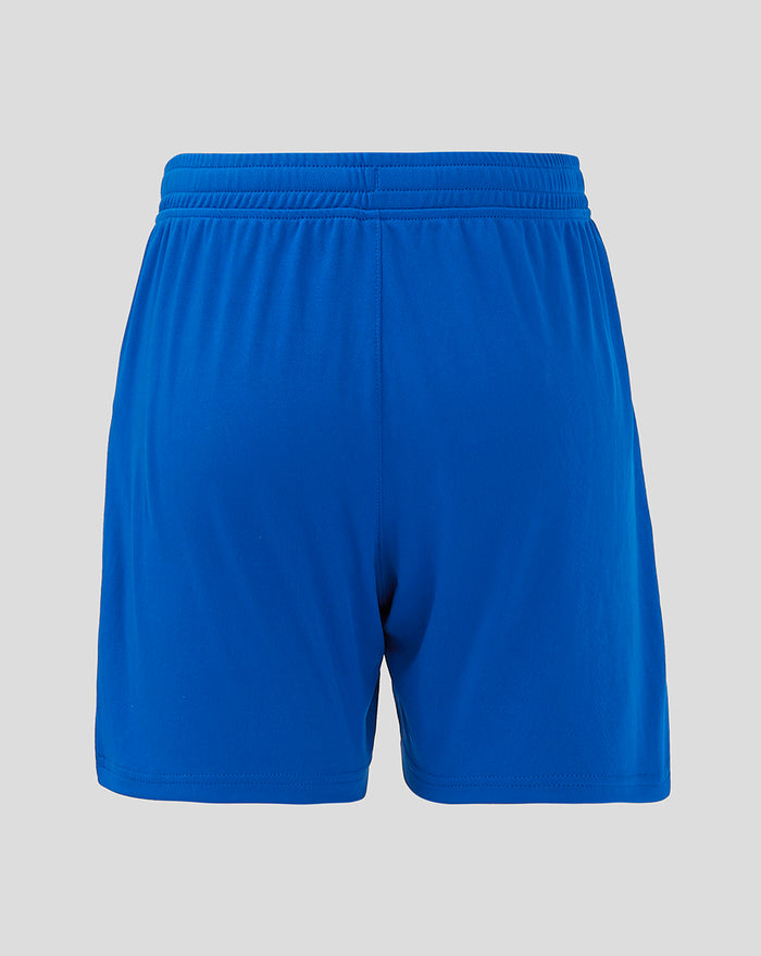 Rear view of blue shorts with elastic waistband and center seam.