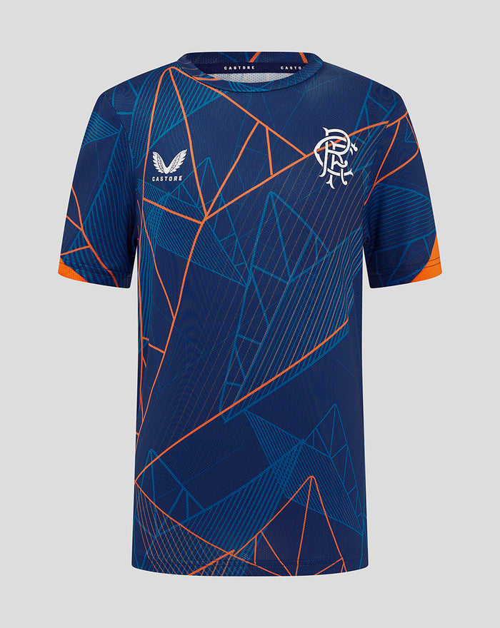 Front view of a blue junior 24/25 league matchday T shirt with orange geometric lines and a white team crest