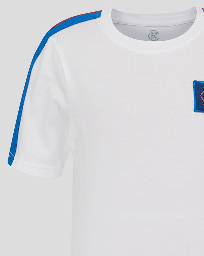 Neckline close-up of white Rangers T shirt with blue shoulder stripe and embroidered chest patch.