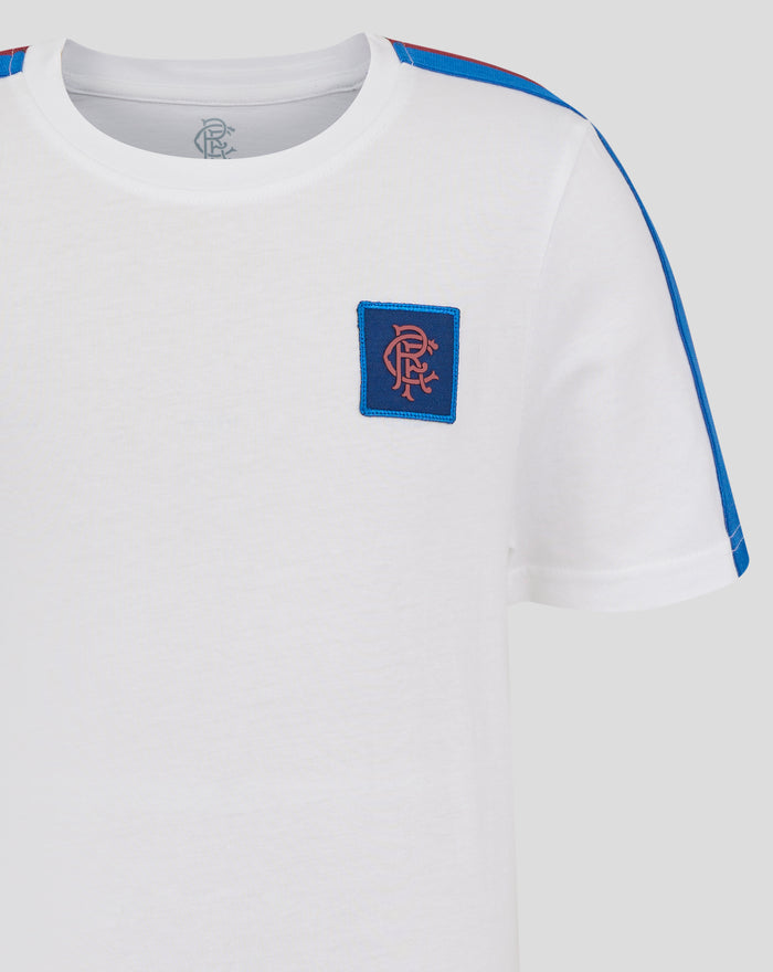 Close-up of white Junior Classic Cotton Rangers T shirt showing blue shoulder stripe and a navy chest patch with pink Rangers emblem.