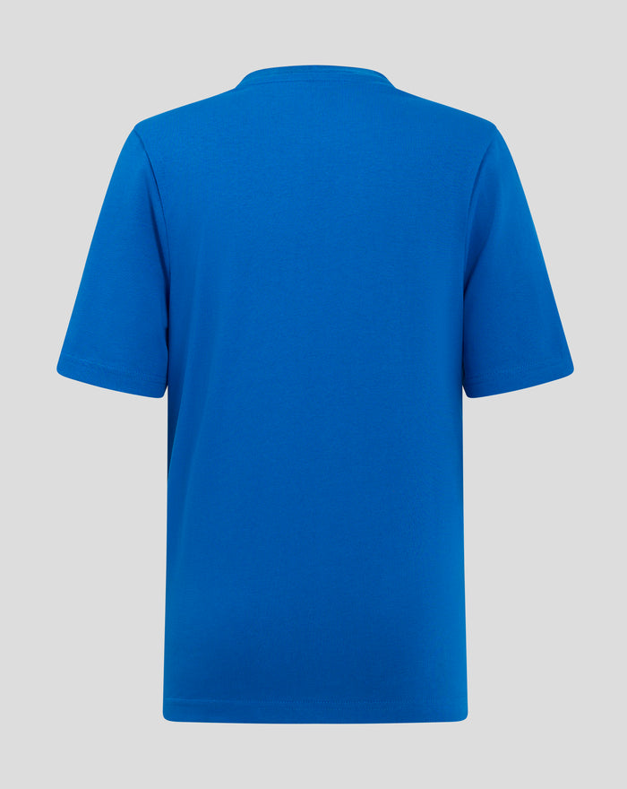 Front view of blue Junior Crest T shirt with a large white crest graphic on the lower front.