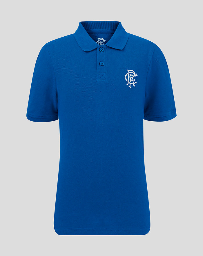 Front view of blue junior core polo shirt with collar and crest logo on left chest