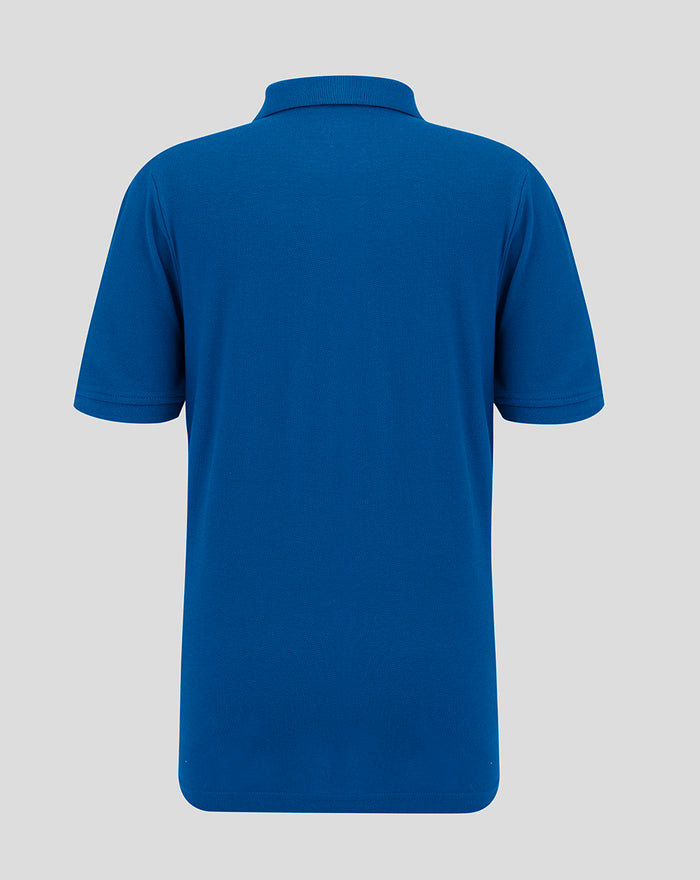 Back view of blue Junior Core Polo showing short sleeves and clean hem