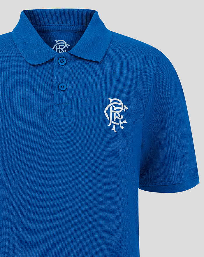 Blue Junior Core Polo close up with collar two button placket and white crest on the chest