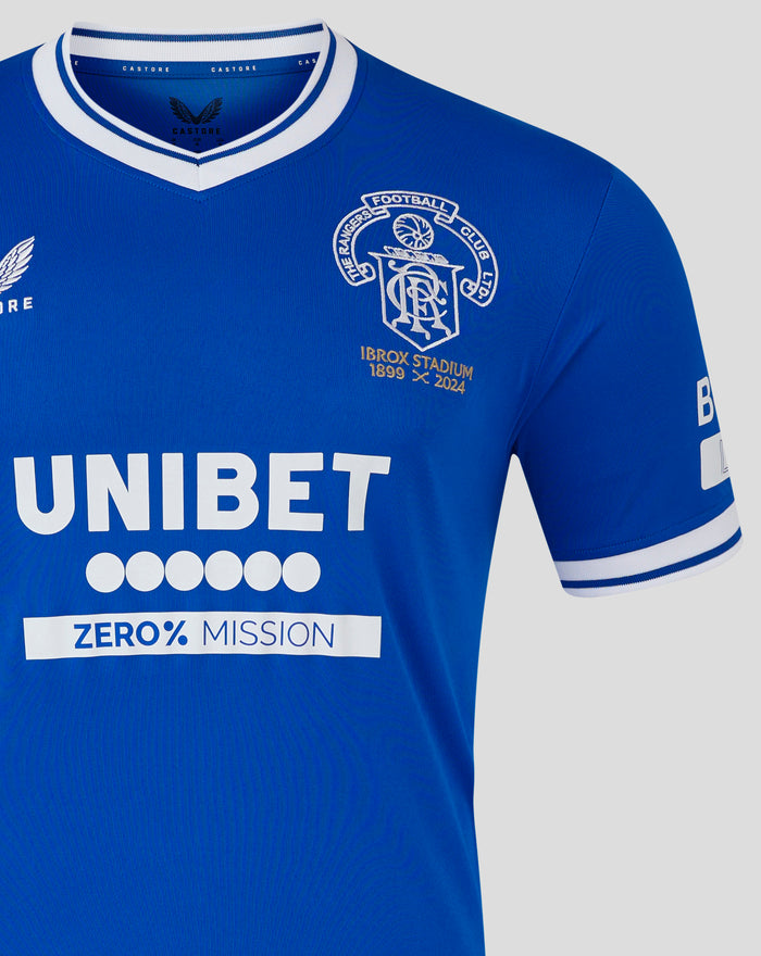 Close up of blue Rangers Ibrox 125 heritage jersey showing crest and UNIBET sponsor across chest