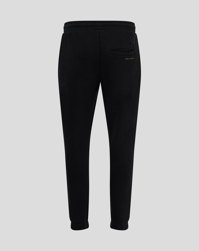 Back view of black Rangers Ibrox 125 Heritage joggers with back pocket and Castore logo.