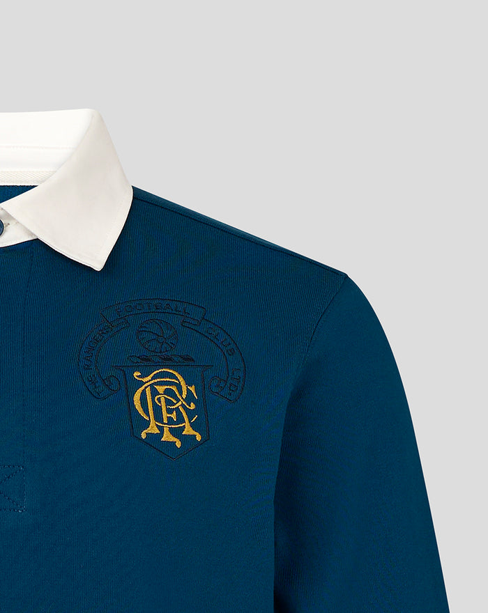 Close up of blue Rangers heritage polo showing white collar and chest crest embroidery